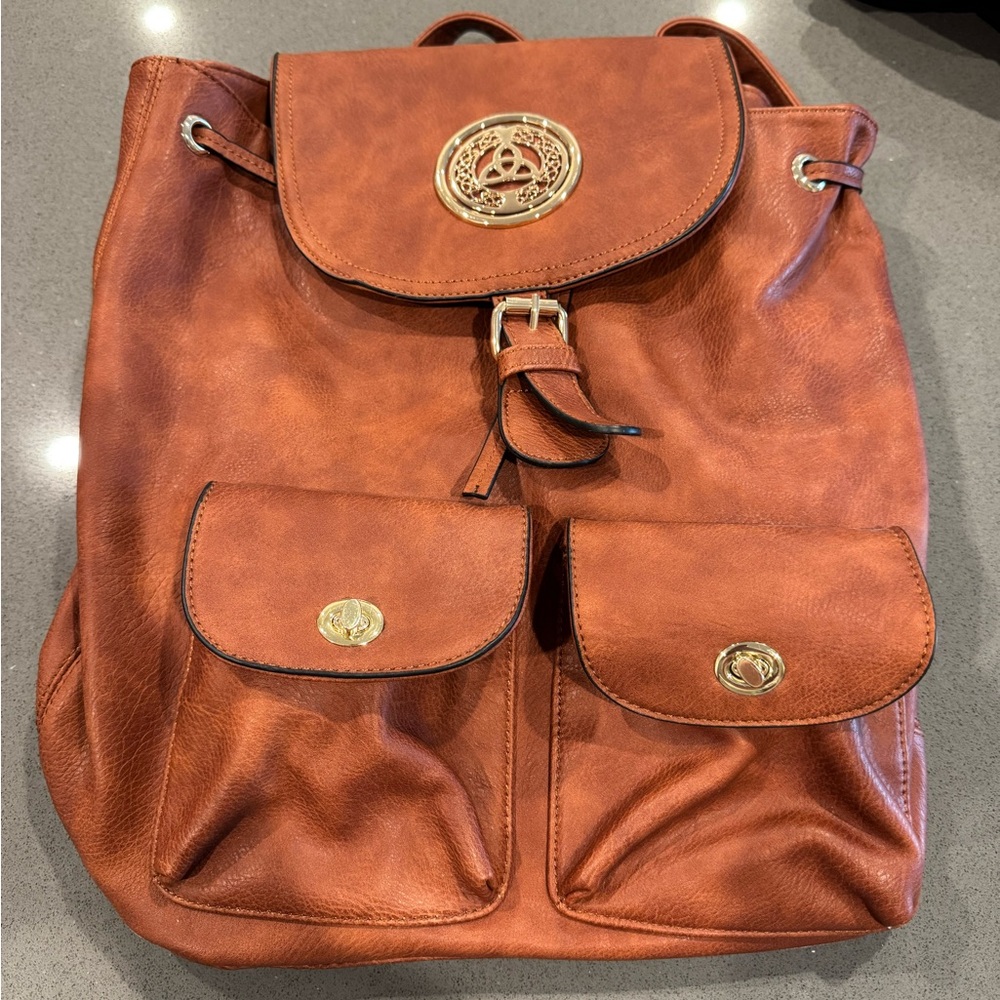 Brown Leather Backpack with Celtic metal design